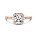 2.50 carat solitaire halo ring with a lab grown cushion diamond in red gold with round lab grown diamonds