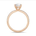 1.00 carat solitaire ring with a lab grown cushion diamond in red gold with lab grown side diamonds