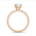 3.00 carat solitaire ring with a lab grown cushion diamond in red gold with lab grown side diamonds