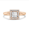1.50 carat solitaire halo ring with a lab grown princess diamond in red gold with round lab grown diamonds