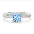 3.00 carat solitaire ring with a blue lab grown princess diamond in white gold with lab grown side diamonds