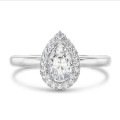 2.50 carat solitaire halo ring with lab grown pear diamond in white gold with round lab grown diamonds