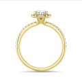 2.50 carat solitaire halo ring with lab grown pear diamond in yellow gold with round lab grown diamonds