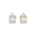 2.00 carat solitaire lab grown pear cut diamond earrings in yellow gold