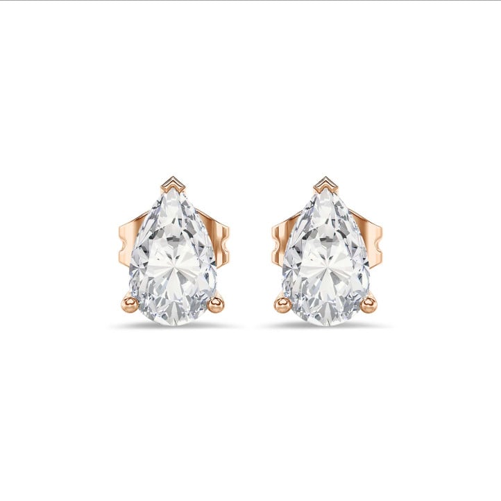 4.00 carat solitaire lab grown pear cut diamond earrings in red gold