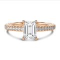 1.00 carat solitaire ring with a lab grown emerald cut diamond in red gold with lab grown side diamonds
