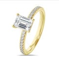 3.00 carat solitaire ring with a lab grown emerald cut diamond in yellow gold with lab grown side diamonds