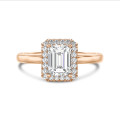 2.00 carat solitaire halo ring with a lab grown emerald cut diamond in red gold with round lab grown diamonds