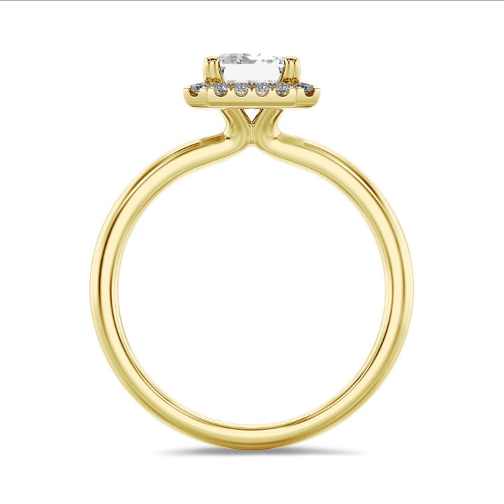 2.00 carat solitaire halo ring with a lab grown emerald cut diamond in yellow gold with round lab grown diamonds