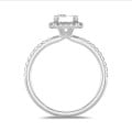 2.00 carat solitaire halo ring with a lab grown emerald cut diamond in white gold with round lab grown diamonds
