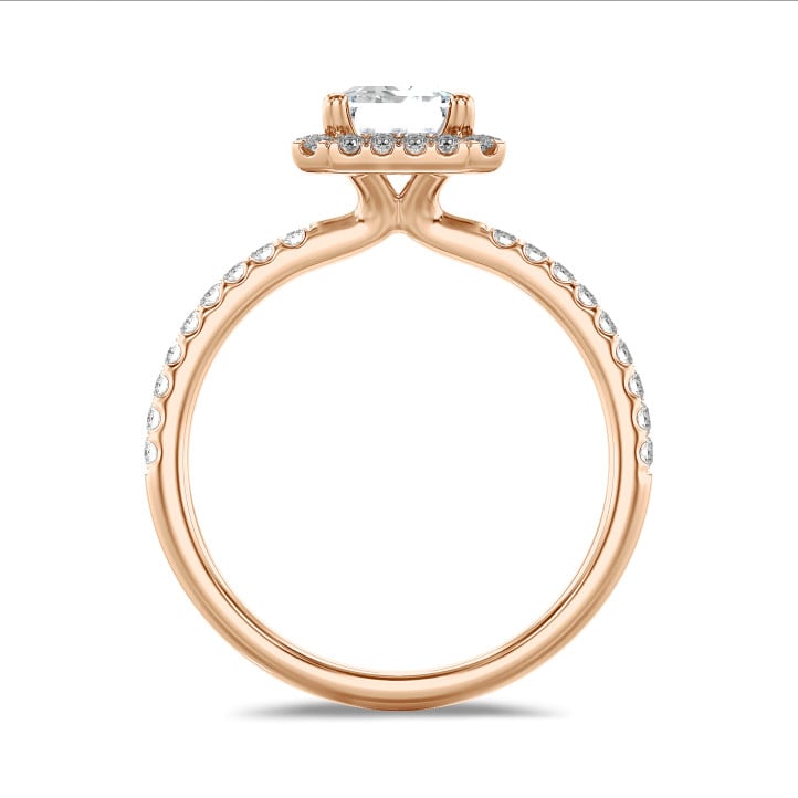 2.50 carat solitaire halo ring with a lab grown emerald cut diamond in red gold with round lab grown diamonds