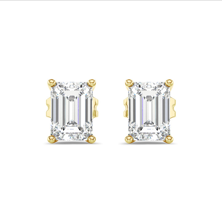4.00 carat solitaire lab grown emerald cut diamond earrings in yellow gold