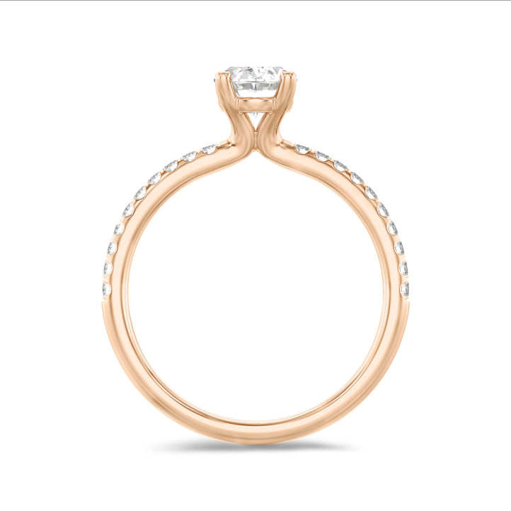 1.50 carat solitaire ring with lab grown oval diamond in red gold with lab grown side diamonds