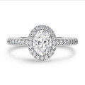 2.50 carat solitaire halo ring with lab grown oval diamond in white gold with round lab grown diamonds