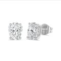 2.00 carat solitaire lab grown oval cut diamond earrings in white gold
