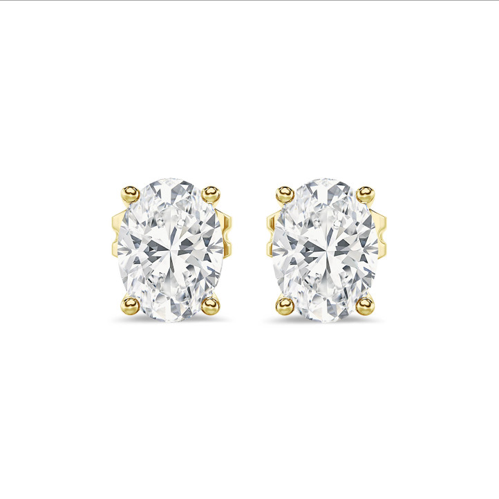 2.00 carat solitaire lab grown oval cut diamond earrings in yellow gold