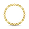 Stackable beaded ring in yellow gold
