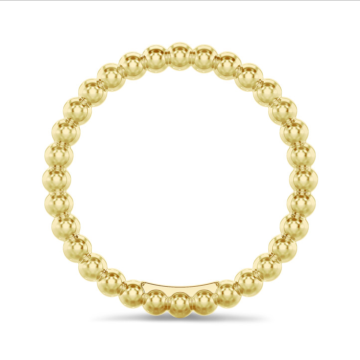 Stackable beaded ring in yellow gold
