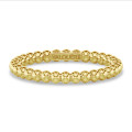 Stackable beaded ring in yellow gold