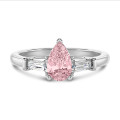 1.00 carat trilogy ring in platinum with pink lab grown pear diamond and lab grown tapered baguettes