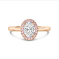 2.00 carat solitaire halo ring with lab grown oval diamond in red gold with round pink lab grown diamonds