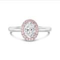 2.00 carat solitaire halo ring with lab grown oval diamond in red gold with round pink lab grown diamonds