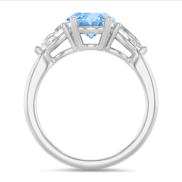 One of a kind trilogy ring with a 2.00 carat Fancy Intense-Vivid Blue oval diamond with white side pear diamonds of 0.30 carat each in white gold