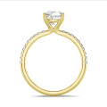 5.00 carat solitaire ring with a lab grown cushion diamond in yellow gold with lab grown side diamonds