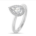 5.00 carat solitaire halo ring with lab grown pear diamond in white gold with round lab grown diamonds