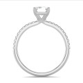 5.00 carat solitaire ring with a lab grown emerald cut diamond in white gold with lab grown side diamonds
