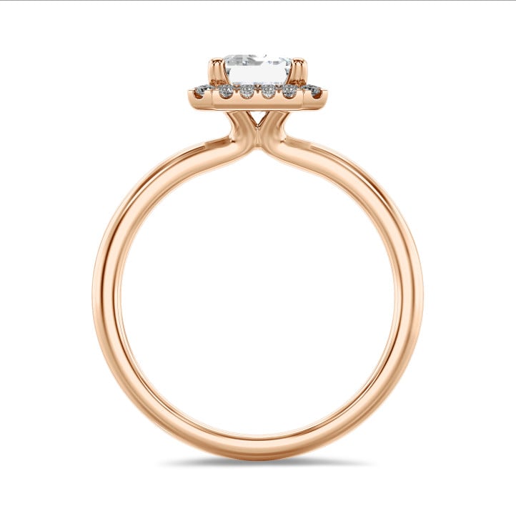 5.00 carat solitaire halo ring with a lab grown emerald cut diamond in red gold with round lab grown diamonds