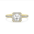 2.00 carat solitaire halo ring with a lab grown asscher cut diamond in yellow gold and round lab grown diamonds