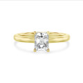 1.50 carat solitaire ring with a lab grown radiant cut diamond in yellow gold