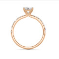 1.00 carat solitaire ring with a lab grown radiant cut diamond in red gold and lab grown side diamonds