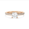 1.50 carat solitaire ring with a lab grown asscher cut diamond and hidden halo in red gold