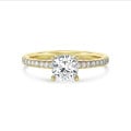 1.20 carat solitaire ring with a lab grown cushion diamond and hidden halo in yellow gold