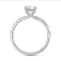 1.50 carat solitaire ring with a lab grown emerald cut diamond and hidden halo in white gold