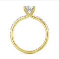 5.00 carat solitaire ring with a lab grown emerald cut diamond and hidden halo in yellow gold
