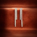 Straight earrings with 3.90 carat lab grown diamonds in red gold