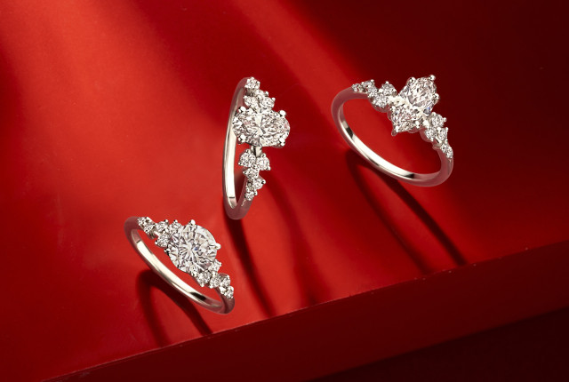 Three white gold engagement rings with round and pear lab-grown diamonds, floral cluster settings