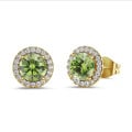 2.00 carat Fancy Vivid Green lab grown diamond halo earrings in yellow gold