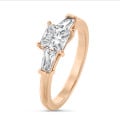 2.00 carat trilogy ring in red gold with a lab grown princess diamond and lab grown tapered baguettes