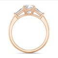 3.00 carat trilogy ring in red gold with a lab grown cushion diamond and lab grown tapered baguettes
