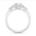 3.00 carat trilogy ring in platinum with a lab grown cushion diamond and lab grown tapered baguettes