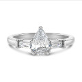 3.00 carat trilogy ring in white gold with lab grown pear diamond and lab grown tapered baguettes