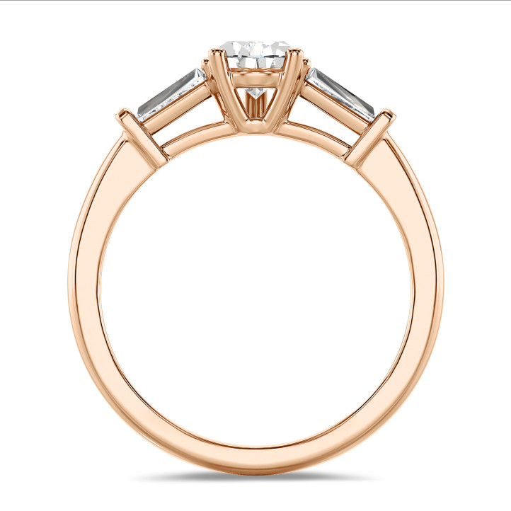 3.00 carat trilogy ring in red gold with lab grown pear diamond and lab grown tapered baguettes