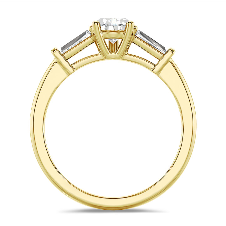 3.00 carat trilogy ring in yellow gold with lab grown pear diamond and lab grown tapered baguettes