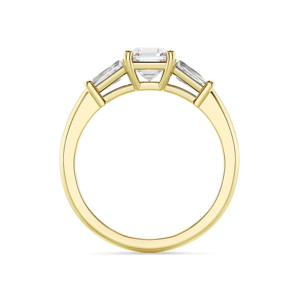 3.00 carat trilogy ring in yellow gold with a lab grown asscher cut diamond and lab grown tapered baguettes