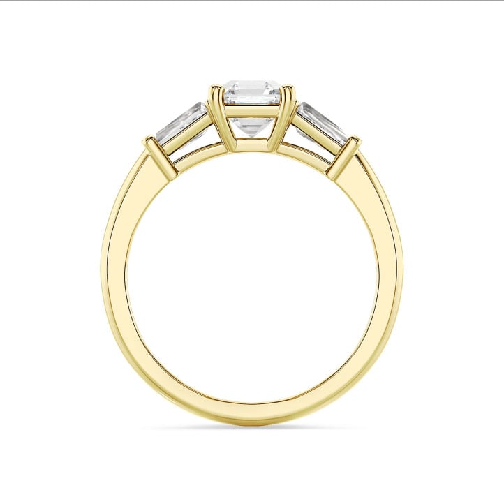 3.00 carat trilogy ring in yellow gold with a lab grown asscher cut diamond and lab grown tapered baguettes