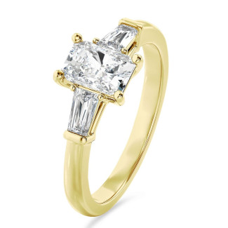 3.00 carat trilogy ring in yellow gold with a lab grown radiant cut diamond and lab gown tapered baguettes